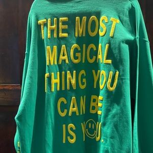 Dressed in LALA green sweatshirt in size L/XL